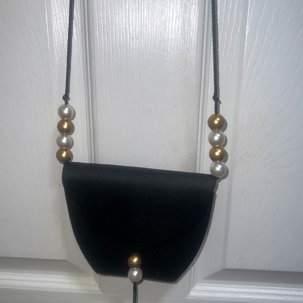 Elegant Black Crossbody Bag with‎ Pearl Accents